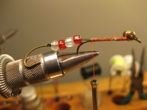 The beads are optional but I think they give the fly an extra boost and it keeps the hook from fouling